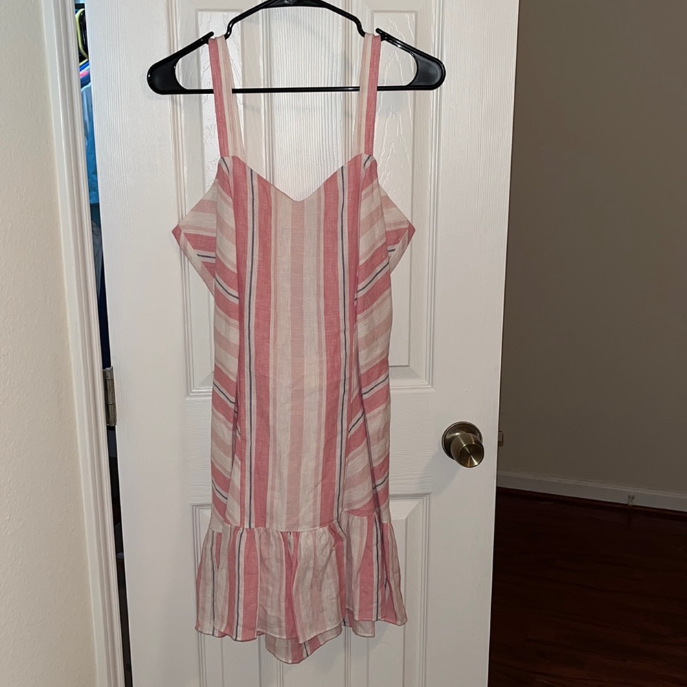 NWT. Shell 100% linen. Fully lined 100% cotton. Zipper back with cute bow tie